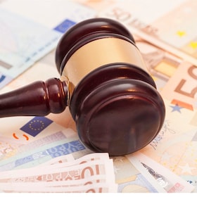 Judge gavel and euro banknotes