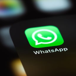 WhatsApp mobile icon app on screen smartphone iPhone macro. WhatsApp is a popular free instant text messaging system for mobile and other platforms. Moscow, Russia - June 15, 2021