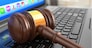 Online internet auction. Gavel on laptop.  3d