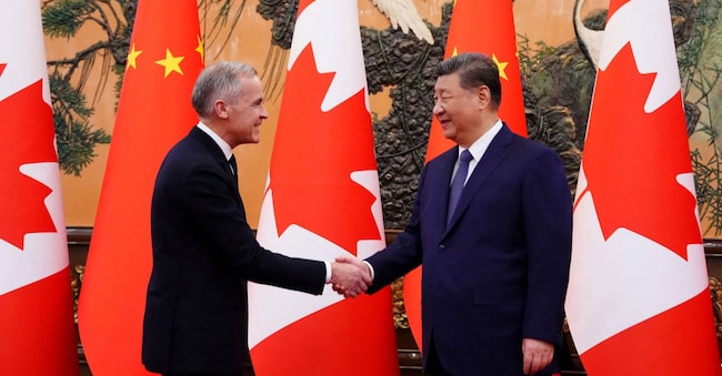 Il primo ministro canadese  Mark Carney con Xi Jinping 