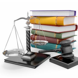 lawyer consultant with auction hammer at courtroom.