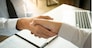 business negotiation in meeting hands shaking successful agreement