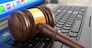 Online internet auction. Gavel on laptop. 3d