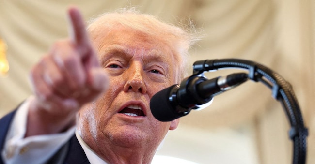 FILE PHOTO: U.S. President Donald Trump speaks at a ceremony held to dedicate a 4-mile stretch of road from West Palm Beach Airport to his Mar-a-Lago estate as 'President Donald J. Trump Boulevard', at the Mar-a-Lago estate in Palm Beach,  Florida, U.S., January 16, 2026.  REUTERS/Kevin Lamarque/File Photo