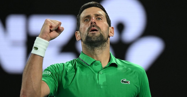 Tennis - Australian Open - Melbourne Park, Melbourne, Australia - 31 gennaio 2026 Il serbo Novak Djokovic festeggia la vittoria  contro l'italiano Jannik Sinner REUTERS/Jaimi Joy