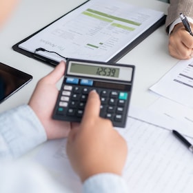 business man Auditor or internal revenue service staff checking annual financial statements company Audit  Accounting tax