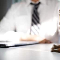 justice lawyer in a office , selected focus on hammer.