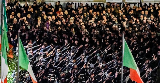 Far-right activists as they use the fascist 'Roman salute' at the end of the memorial rally on the 47th anniversary of the massacre of Msi (Movimento Sociale Italiano - Right Party) headquarter 'Acca Larenzia', in Rome, Italy, 07 January 2025.   ANSA/FABIO FRUSTACI