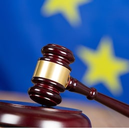 Judge hammer with European flag background