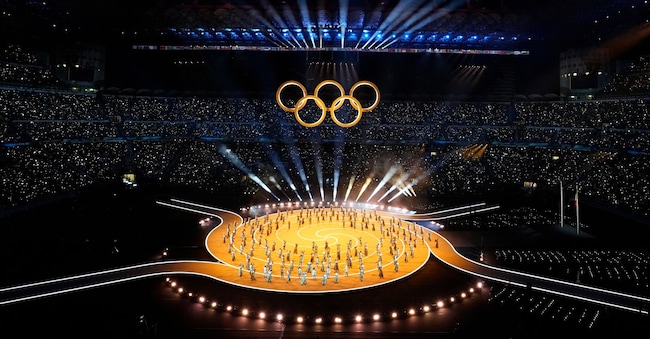 The Olympic rings are formed during the Olympic opening ceremony at the 2026 Winter Olympics, in Milan, Italy, Friday, Feb. 6, 2026. (AP Photo/Francisco Seco)