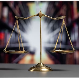 Shiny golden balanced scale in court library background as concept justice and fairness legal symbol. Scale balance for righteous and equality judgment by lawyer and attorney. equility