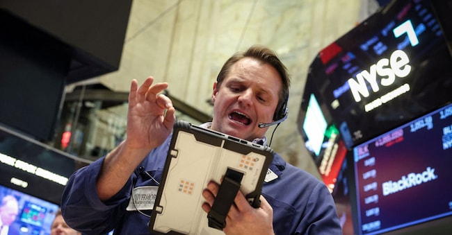 Traders work on the floor at the New York Stock Exchange (NYSE) in New York City, U.S., February 13, 2026.  REUTERS/Brendan McDermid