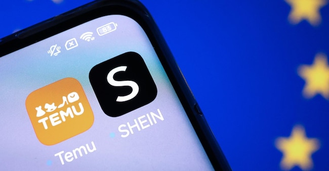 L'app di e-commerce Shein è visualizzata su uno smartphone sullo sfondo di uno schermo con la bandiera dell'Unione Europea (UE) (sul retro), a Berlino, Germania, il 7 febbraio 2025 (ripubblicato il 17 febbraio 2026). EPA/HANNIBAL HANSCHKE