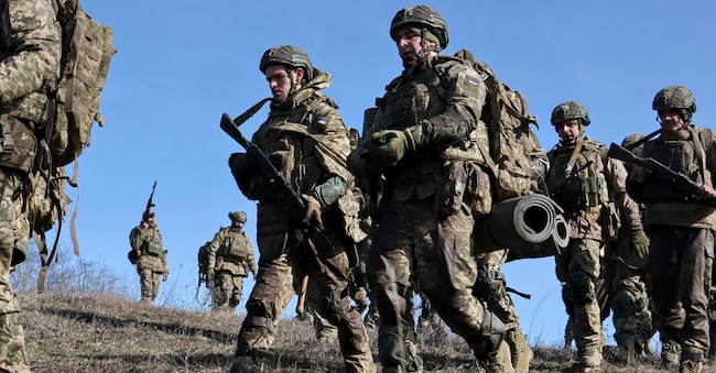 Una foto diffusa dal servizio stampa della 65ª Brigata meccanizzata separata delle forze armate ucraine mostra le reclute mentre partecipano a una sessione di addestramento in una località segreta nella regione di Zaporizhzhia, in Ucraina, il 22 febbraio 2026.   EPA/SERVIZIO STAMPA DELLA 65ª BRIGATA MECCANIZZATA / 