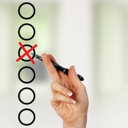 Image of a check list with red mark