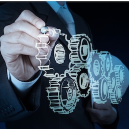 businessman hand draws gear to success concept