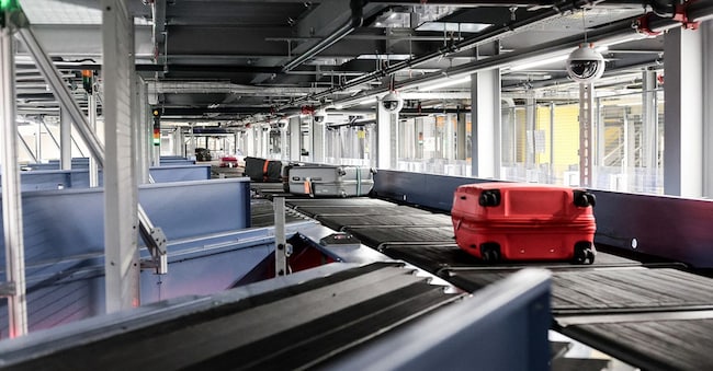 Il sistema Mbhs cross belt sorter