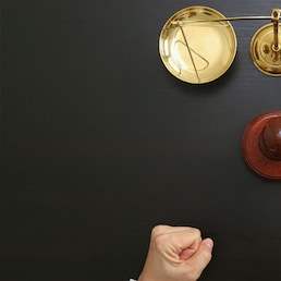 Law gavel on a stack of American money