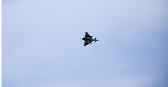 An aircraft flies near RAF Akrotiri, a British sovereign base that was hit by a drone early on Monday, causing limited damage, in Cyprus, March 6, 2026. REUTERS/Yiannis Kourtoglou