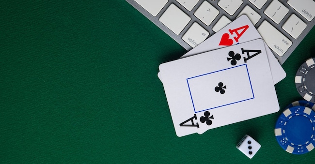 Poker online, casino, online gaming business. Chips, money cards and pc.