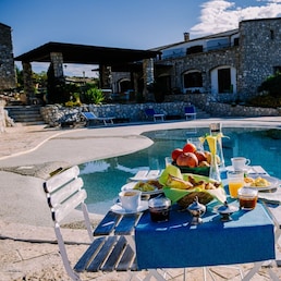 Breakfast at Agriturismo bed and breakfast at Sicily Italy, beautiful historical old farm renovated as BB Sicilia Fokke Baarssen - stock.adobe.com