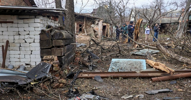 The site of a Russian drone strike on a private building in Kharkiv, northeastern Ukraine, 25 March 2026, amid the Russian invasion. At least eight people were injured as a result of the overnight Russian attack on the residential areas in Kharkiv, according to the State Emergency Service report. EPA/SERGEY KOZLOV EPA
