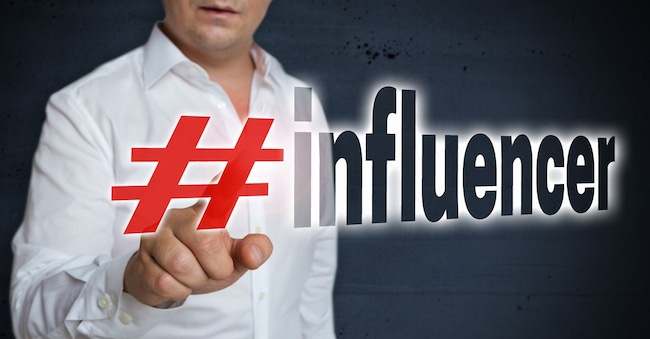Influencer touchscreen is operated by man concept.
