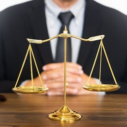 gavel and soundblock of justice law and lawyer working on wooden desk background