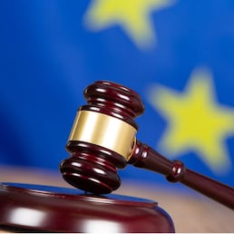 Judge hammer with European flag background