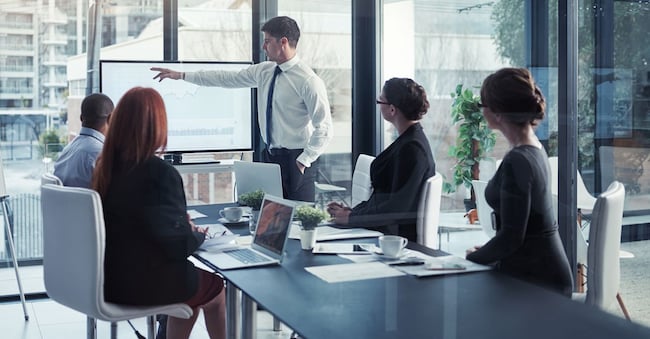 Presentation, team building and meeting for a development strategy or corporate workshop for sales in a company. Board, manager and business man or speaker talking about growth or negotiation. Thurstan Hinrichsen/peopleimages.com - stock.adobe.com