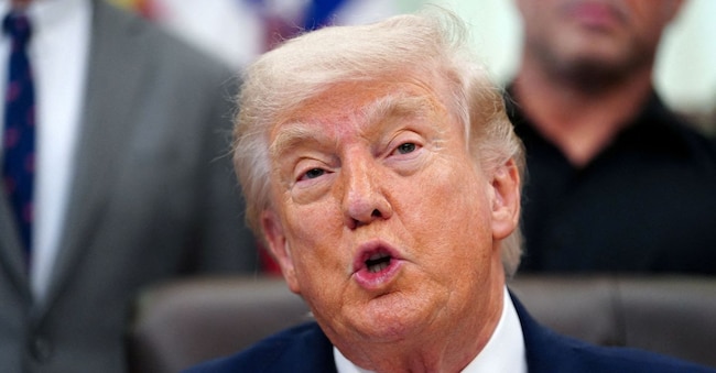 FILE PHOTO: U.S. President Donald Trump speaks about research into mental health treatments in the Oval Office of the White House in Washington, D.C., April 18, 2026. REUTERS/Nathan Howard/File Photo REUTERS