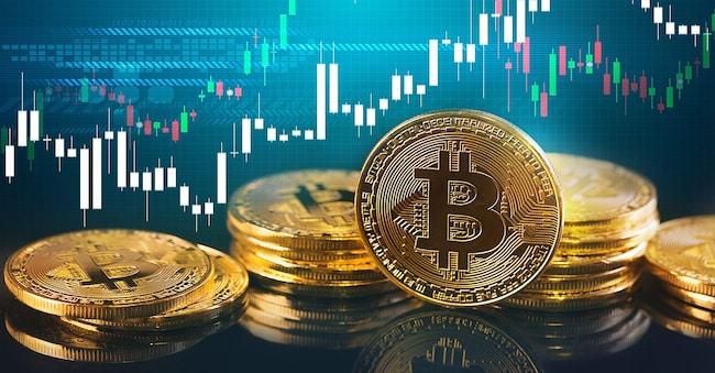 Bitcoins and New Virtual money concept.Gold bitcoins with Candle stick graph chart and digital background.Golden coin with icon letter B.Mining or blockchain technology Jaruwan photo - stock.adobe.com