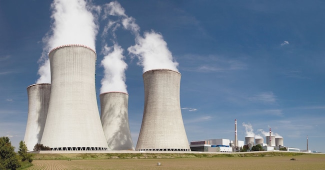 Nuclear power plant Dukovany - cooling towers, field and beautiful sky - Czech Republic Daniel Prudek - stock.adobe.com