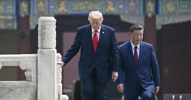 Il presidente degli Stati Uniti Donald Trump e il suo omologo cinese Xi Jinping durante la vista al Tempio del cielo di Pechino APN