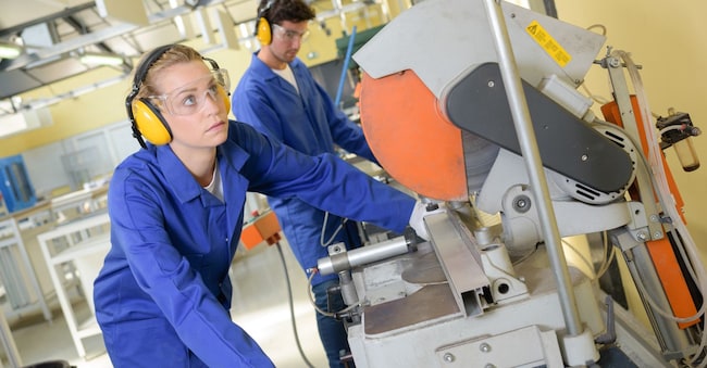 Woman using industrial machinery auremar - stock.adobe.com