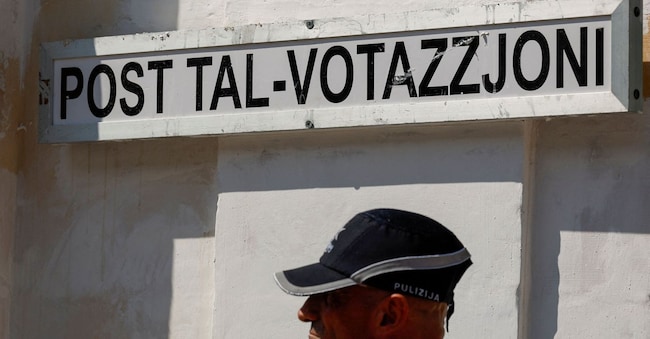 A police officer stands in front of a polling station during Malta's general election, in Zejtun, Malta, May 30, 2026.  REUTERS/Darrin Zammit Lupi      TPX IMAGES OF THE DAY REUTERS