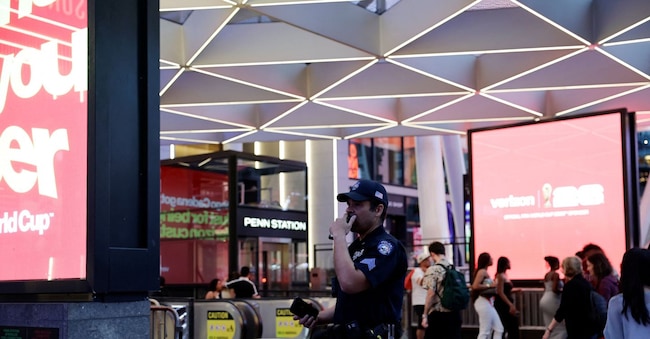 A police officer stands guard after reports of a stabbing incident at Penn Station in New York City, U.S., June 7, 2026.  REUTERS/Jeenah Moon