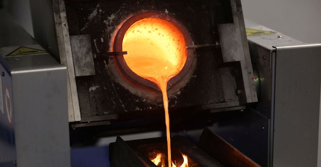Molten gold from old jewellery, including luxury watches, is poured into a mould at Hatton Garden Metals in London, Britain, June 10, 2026. REUTERS/Toby Shepheard REUTERS
