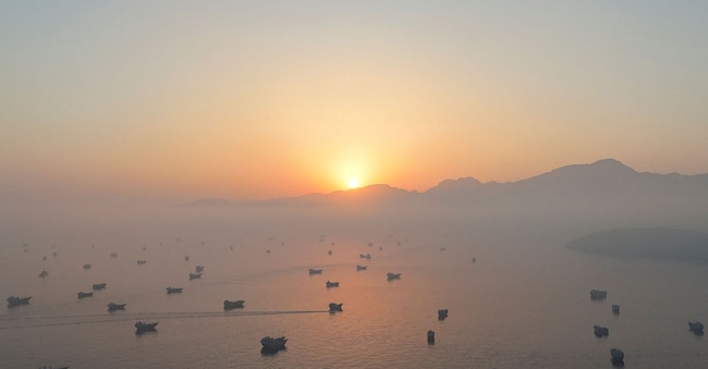 A drone view shows vessels in the Strait of Hormuz, as seen from Musandam, Oman, June 15, 2026. REUTERS/Stringer     TPX IMAGES OF THE DAY REUTERS