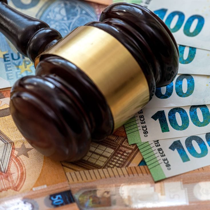 Judge's gavel on  euro bills background.  bribery or corruption concept RomanR - stock.adobe.com
