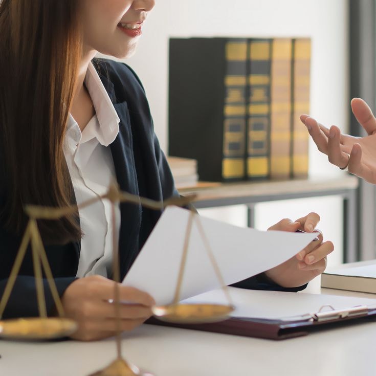 Legal and justice concept, Male lawyer explains contract about regulation to consultant in law firm.