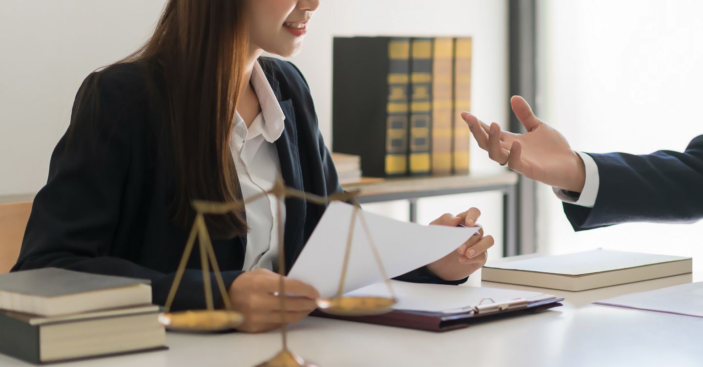 Legal and justice concept, Male lawyer explains contract about regulation to consultant in law firm.