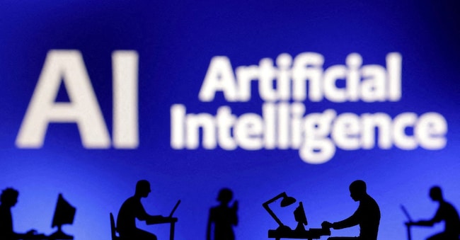 FILE PHOTO: Figurines with computers and smartphones are seen in front of the words "Artificial Intelligence AI" in this illustration taken, February 19, 2024. REUTERS/Dado Ruvic/Illustration/File Photo REUTERS