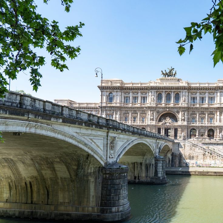 View over the river Tiber with the bridge Ponte Umberto I and in the background the city courthouse (Corte di cassazione) in Rome, Italy Emma - stock.adobe.com