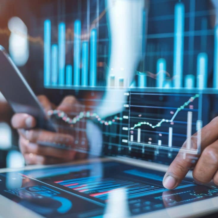 A financial planner presenting investment options to clients, using charts and graphs on a tablet Plaifah - stock.adobe.com