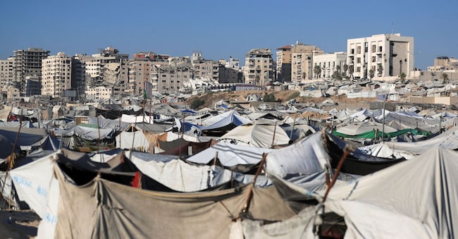 Displaced Palestinians shelter at a tent camp, in Gaza City, July 14, 2026. REUTERS/Dawoud Abu Alkas REUTERS