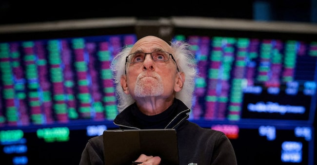FILE PHOTO: A trader works on the floor at the New York Stock Exchange (NYSE) in New York City, U.S., April 7, 2025.  REUTERS/Brendan McDermid/File Photo REUTERS