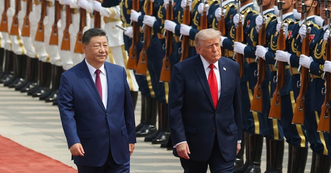 Il presidente cinese Xi Jinping passa in rassegna la Guardia d’onere assieme a Donald Trump in occasione del meeting di maggio EPA