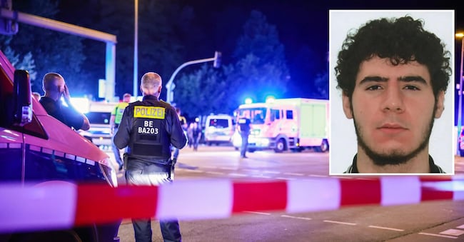 La polizia di Berlino ha pubblicato una foto segnaletica del presunto attentatore, identificato nel 21enne Abdul e mette in guardia affermando che è "armato e pericoloso". 26 luglio 2026. ANSA ANSA