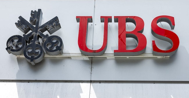 FILE PHOTO: A UBS logo is pictured on the branch of the Swiss bank in Lucerne, Switzerland, June 14, 2024.  REUTERS/Denis Balibouse/File Photo REUTERS